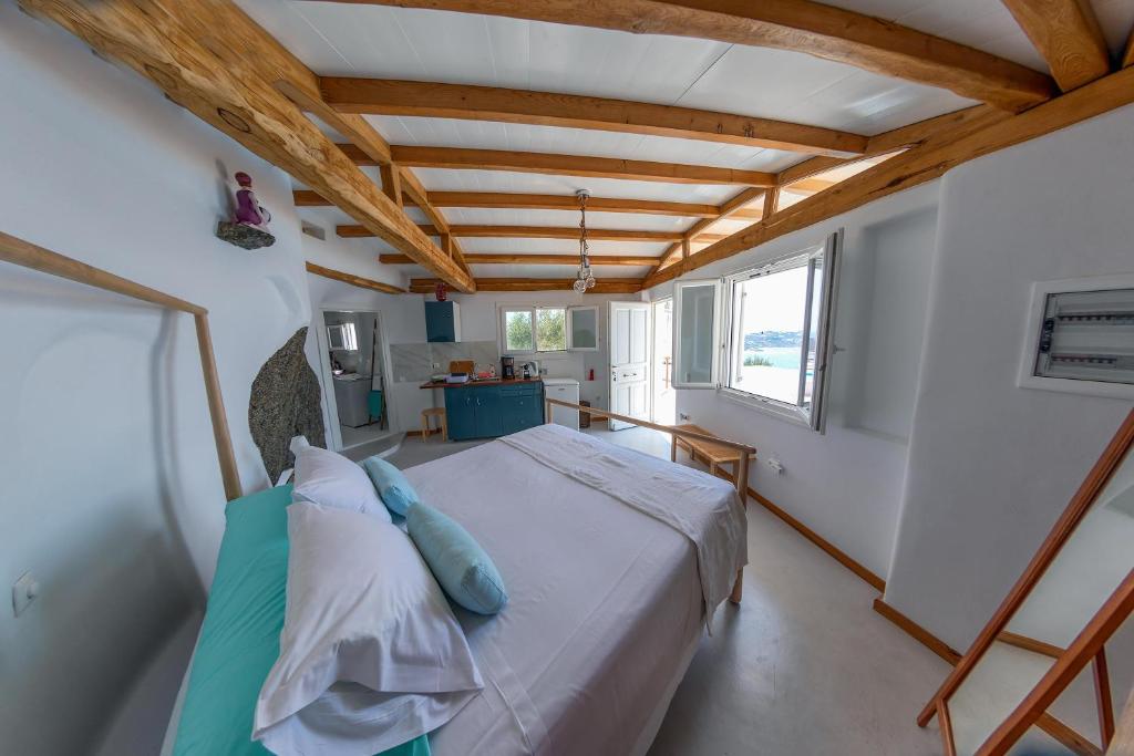 Posteľ alebo postele v izbe v ubytovaní Luxury Suites Poseidon