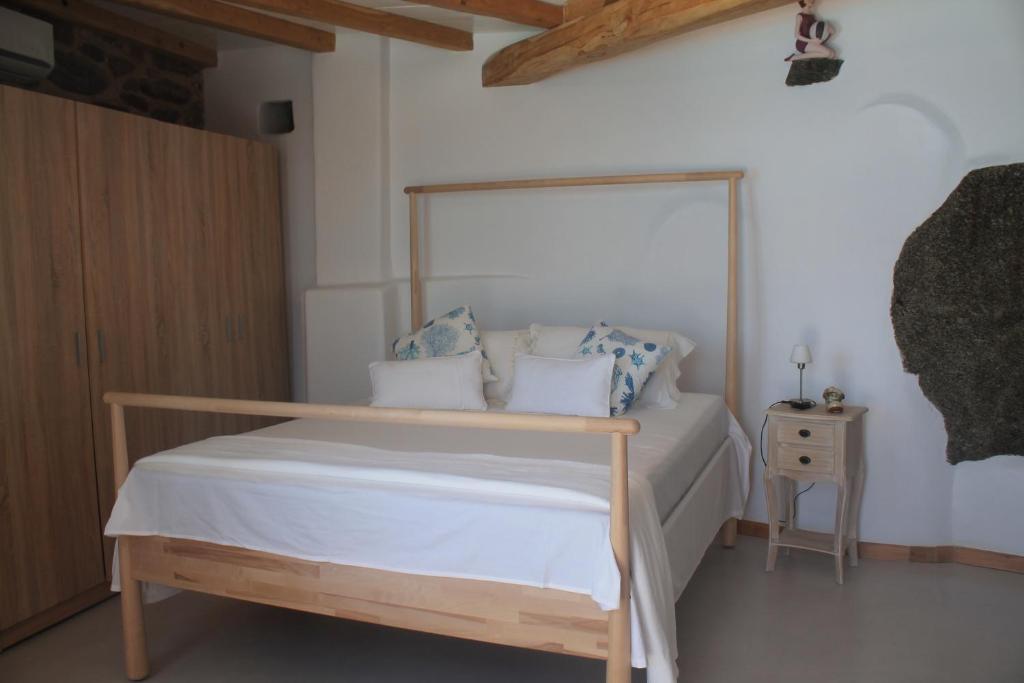 Posteľ alebo postele v izbe v ubytovaní Luxury Suites Poseidon