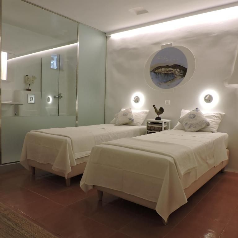Posteľ alebo postele v izbe v ubytovaní Luxury Suites Poseidon