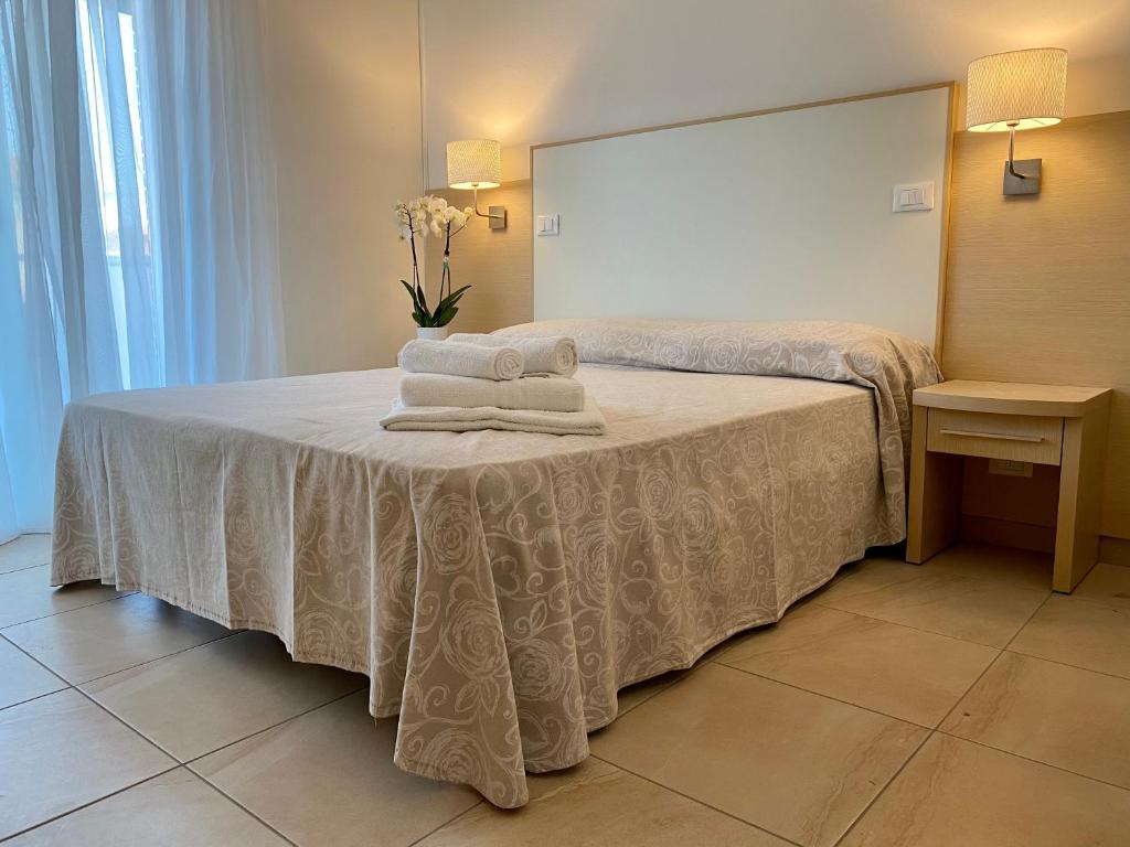 Postel nebo postele na pokoji v ubytování Hotel Palladio B&B