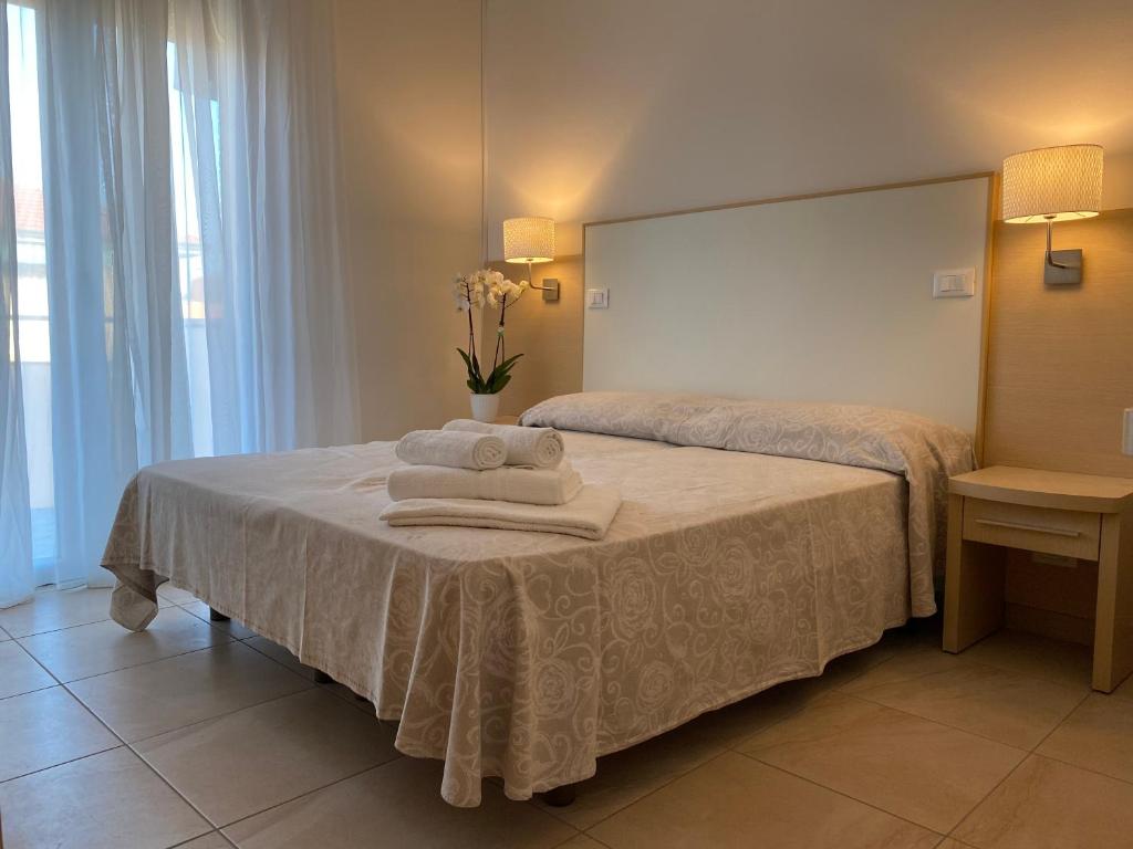 Postel nebo postele na pokoji v ubytování Hotel Palladio B&B