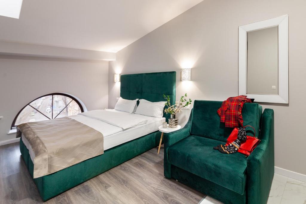 Postel nebo postele na pokoji v ubytování AUSTRIAN APART HOTEL