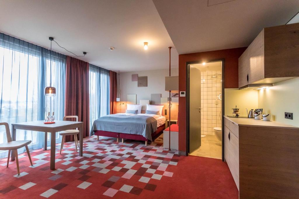 Postel nebo postele na pokoji v ubytování Hotel einsmehr