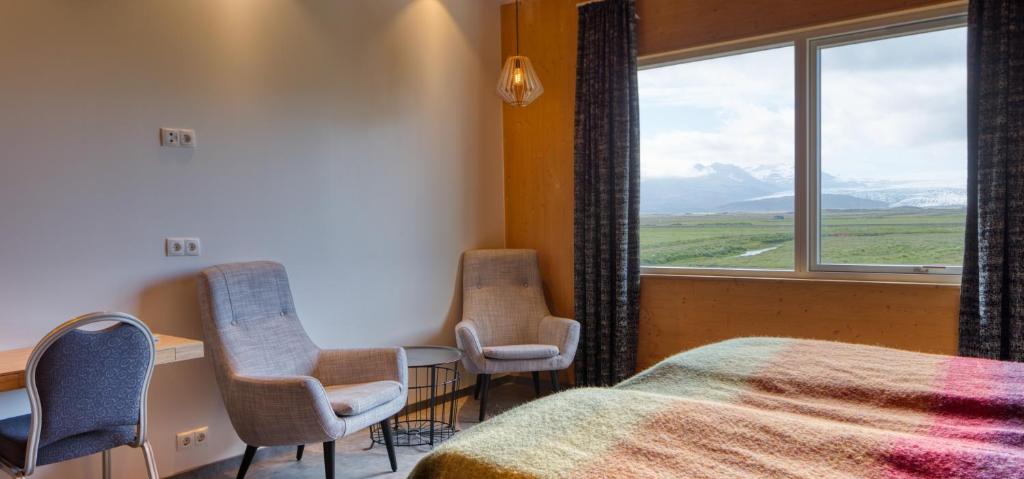 Postel nebo postele na pokoji v ubytování Brunnholl Country Guesthouse