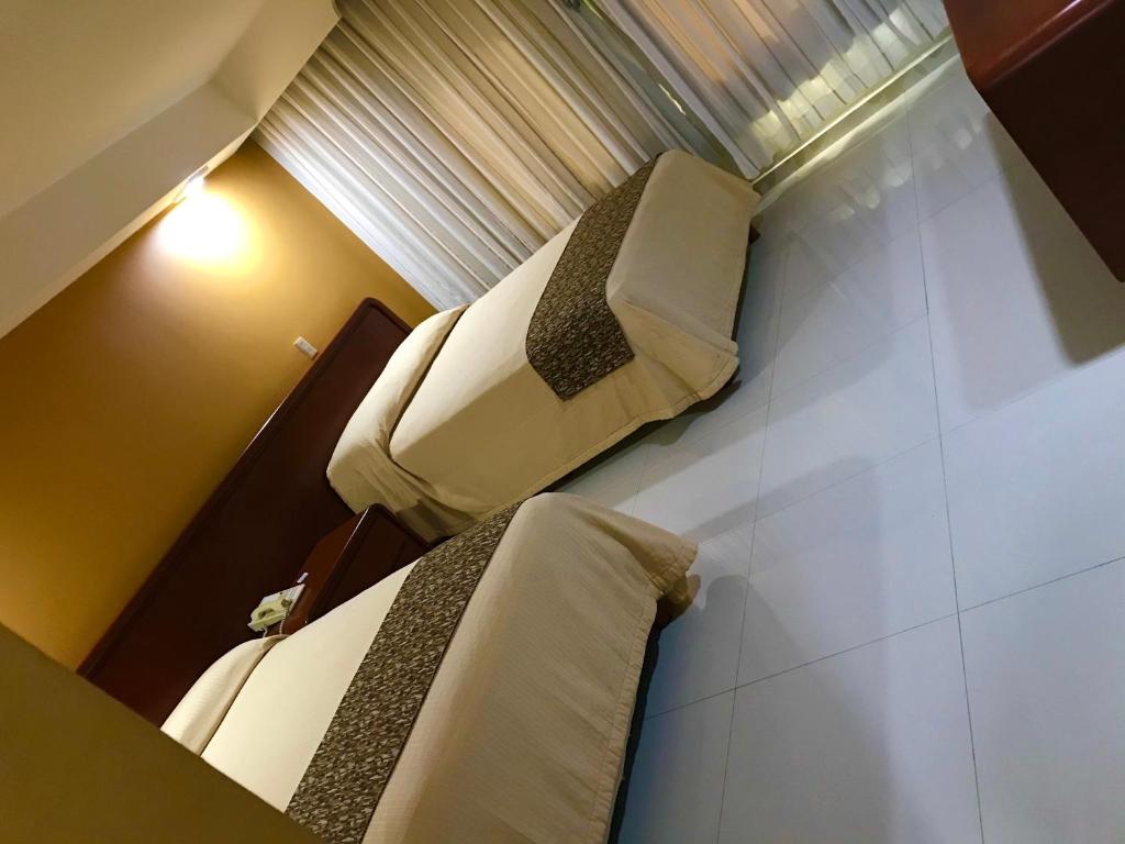 Postel nebo postele na pokoji v ubytování Hotel Villas Dali Veracruz