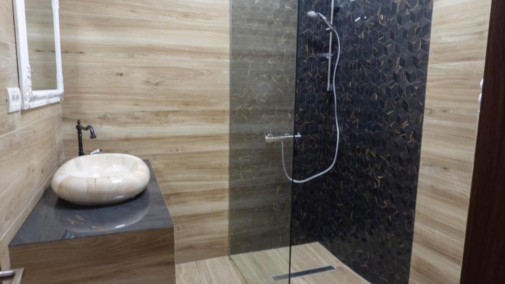 Koupelna v ubytování M Rooms