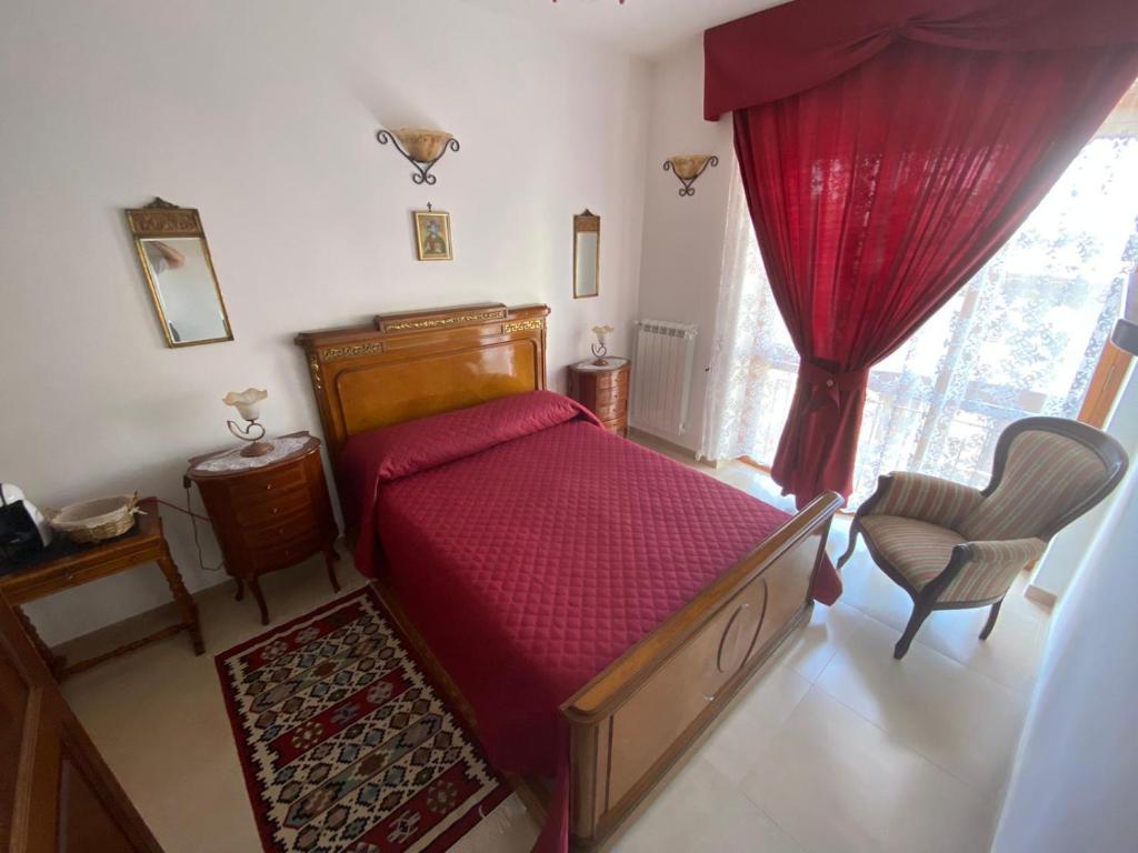 Postel nebo postele na pokoji v ubytování B&B LARAZZO