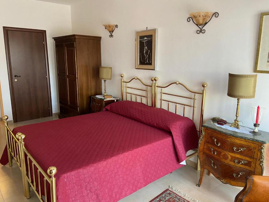 Postel nebo postele na pokoji v ubytování B&B LARAZZO