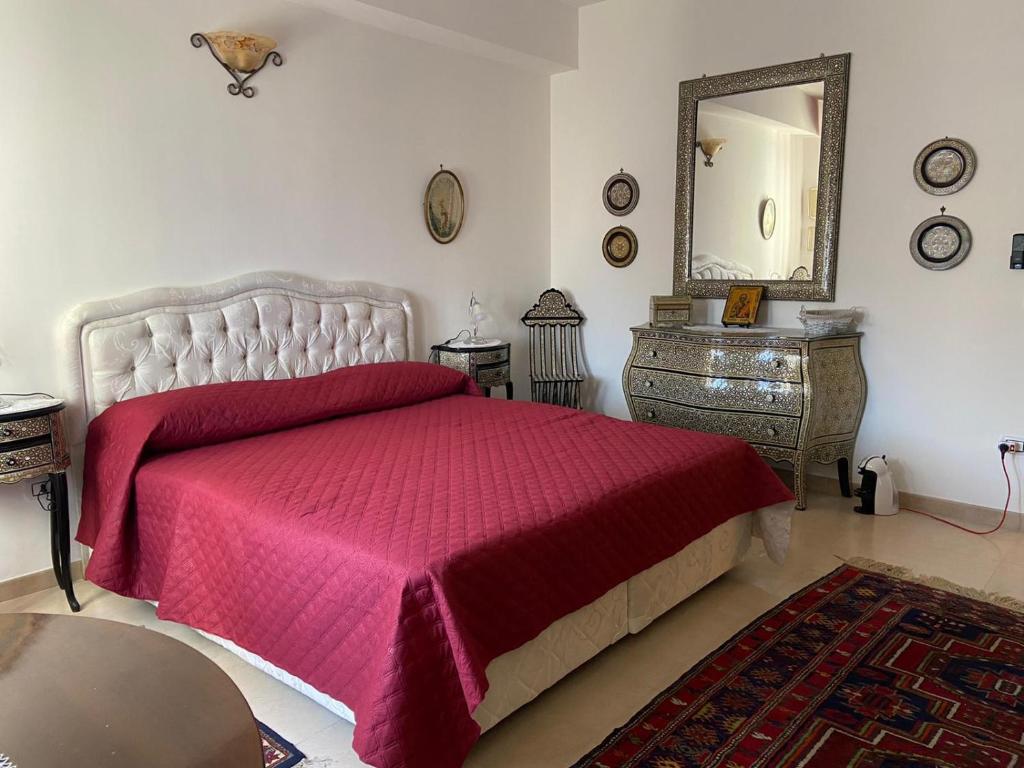 Postel nebo postele na pokoji v ubytování B&B LARAZZO