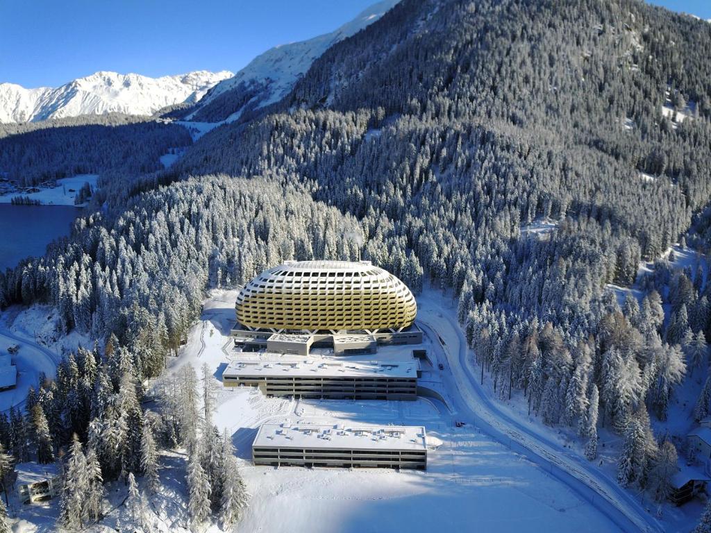an aerial view of a building on a mountain at AlpenGold Hotel Davos in Davos