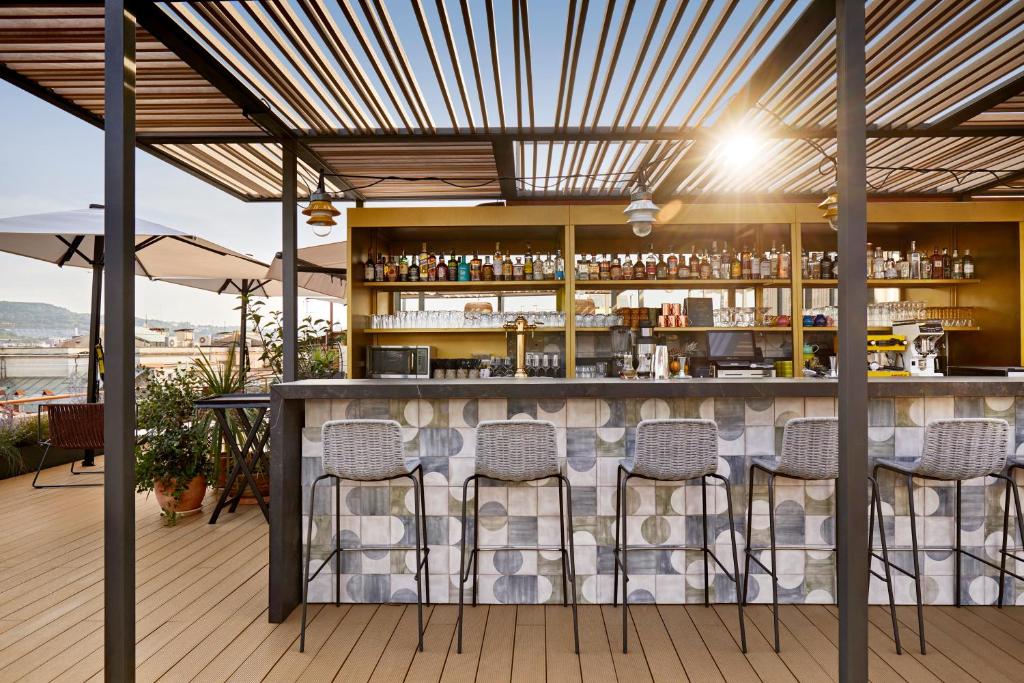 Restaurace v ubytování Kimpton Vividora Hotel by IHG