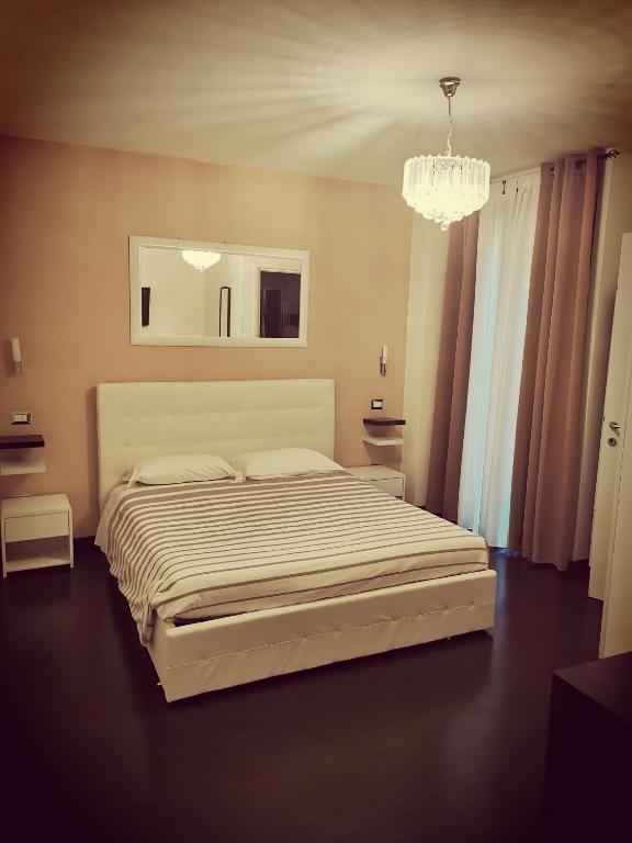 Postel nebo postele na pokoji v ubytování Sweetdreams Plaça Civica