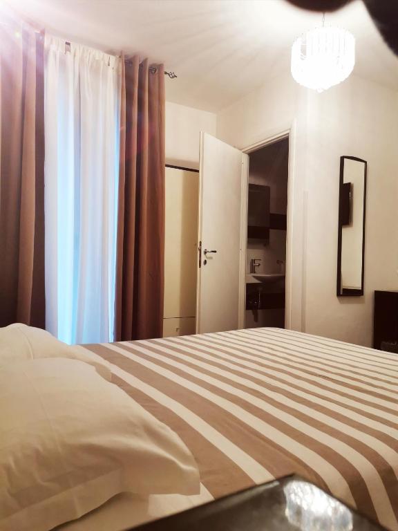 Postel nebo postele na pokoji v ubytování Sweetdreams Plaça Civica