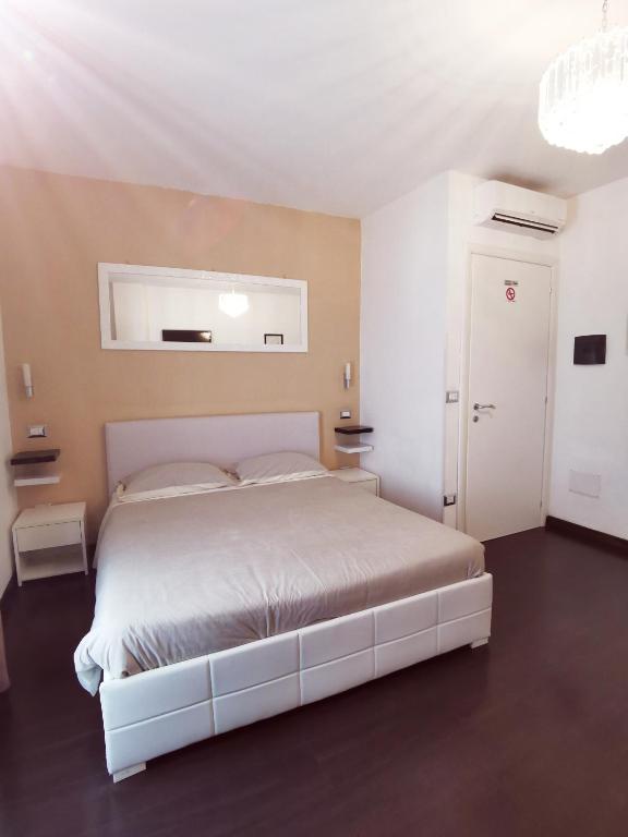 Postel nebo postele na pokoji v ubytování Sweetdreams Plaça Civica