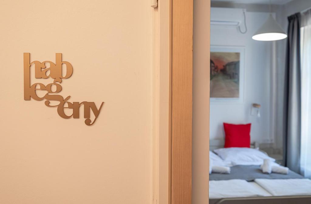 Postel nebo postele na pokoji v ubytování Villa Kabala