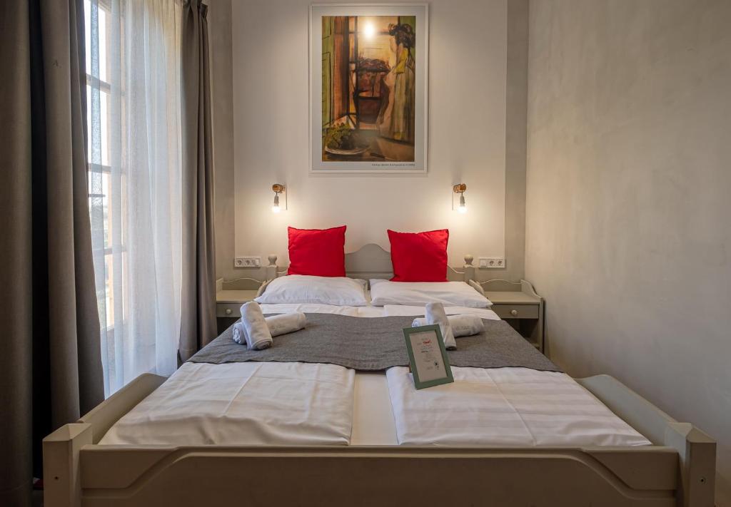 Postel nebo postele na pokoji v ubytování Villa Kabala