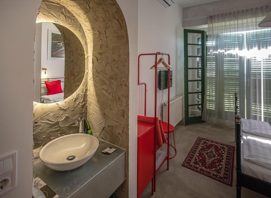 Postel nebo postele na pokoji v ubytování Villa Kabala