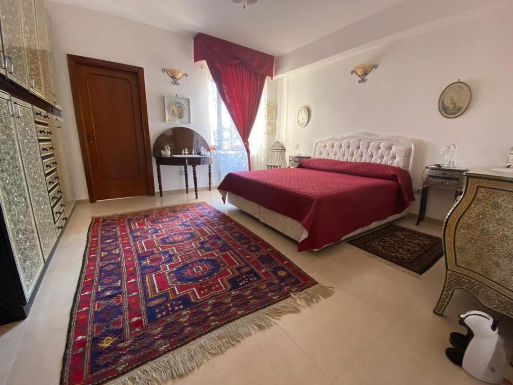 Postel nebo postele na pokoji v ubytování B&B LARAZZO