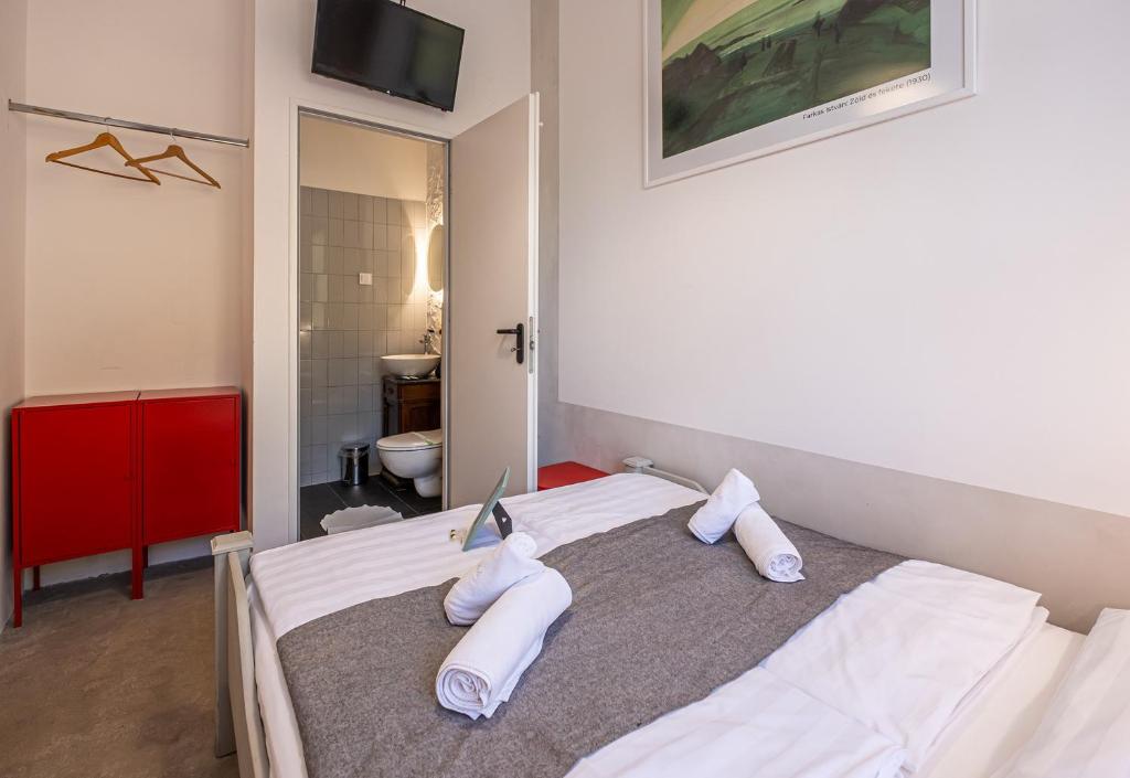 Postel nebo postele na pokoji v ubytování Villa Kabala