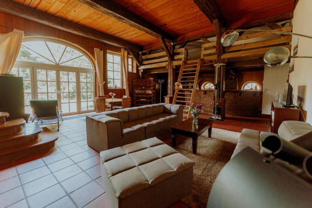 Posezení v ubytování Landhaus Kurzenmoor Remise 100 qm