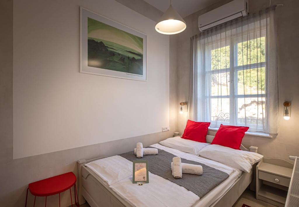 Postel nebo postele na pokoji v ubytování Villa Kabala