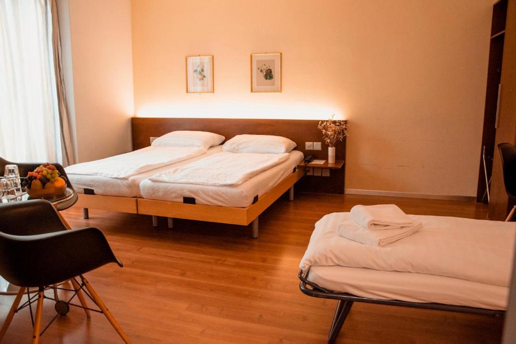 Postel nebo postele na pokoji v ubytování Goldener Schlüssel