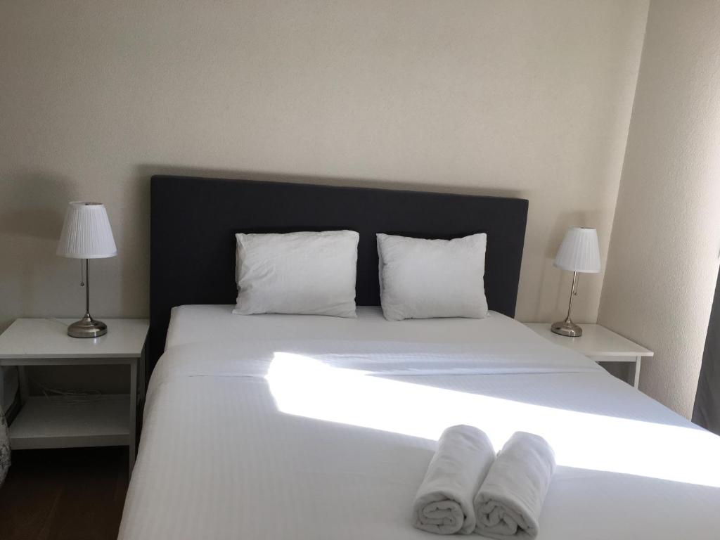 Letto o letti in una camera di ZüriZimmer