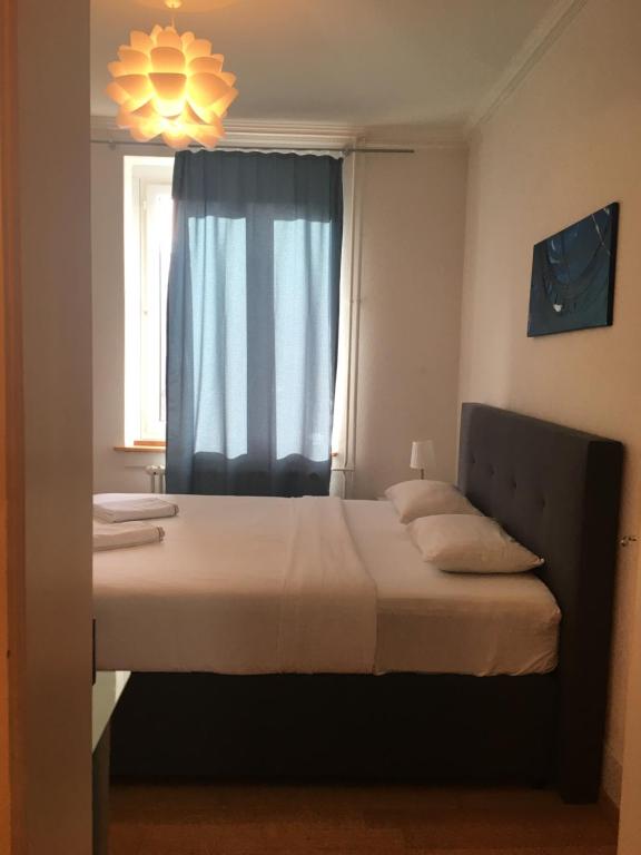 Letto o letti in una camera di ZüriZimmer