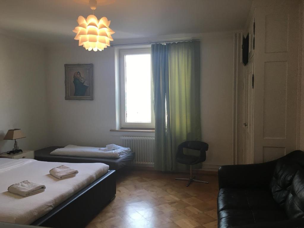 Letto o letti in una camera di ZüriZimmer
