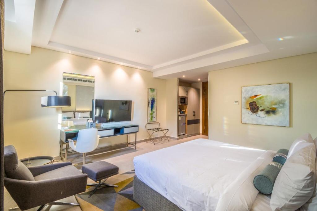 TV a/nebo společenská místnost v ubytování Ewaa Express Hotel - Tabuk