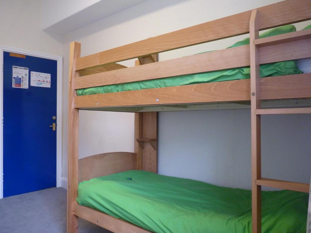 Postel nebo postele na pokoji v ubytování Ingleton Hostel