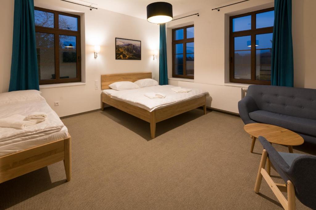 Postel nebo postele na pokoji v ubytování Apartmány Sára
