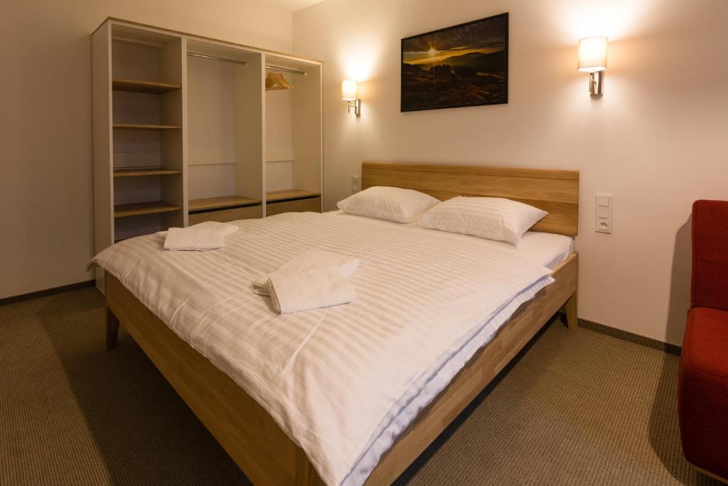Postel nebo postele na pokoji v ubytování Apartmány Sára