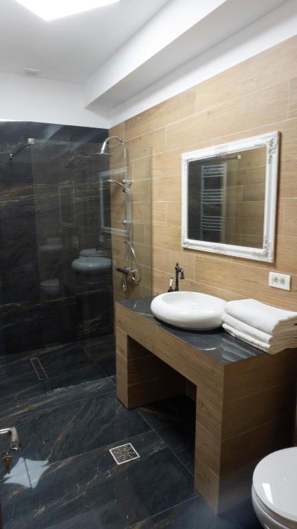 Koupelna v ubytování M Rooms