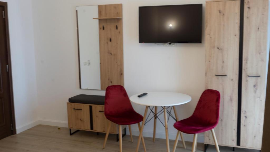 TV a/nebo společenská místnost v ubytování M Rooms