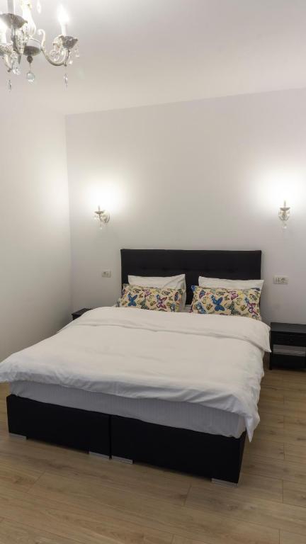 Postel nebo postele na pokoji v ubytování M Rooms