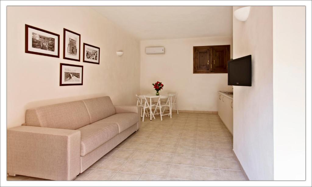 TV a/nebo společenská místnost v ubytování AGRITURISMO CASA VACANZE Antico Baglio