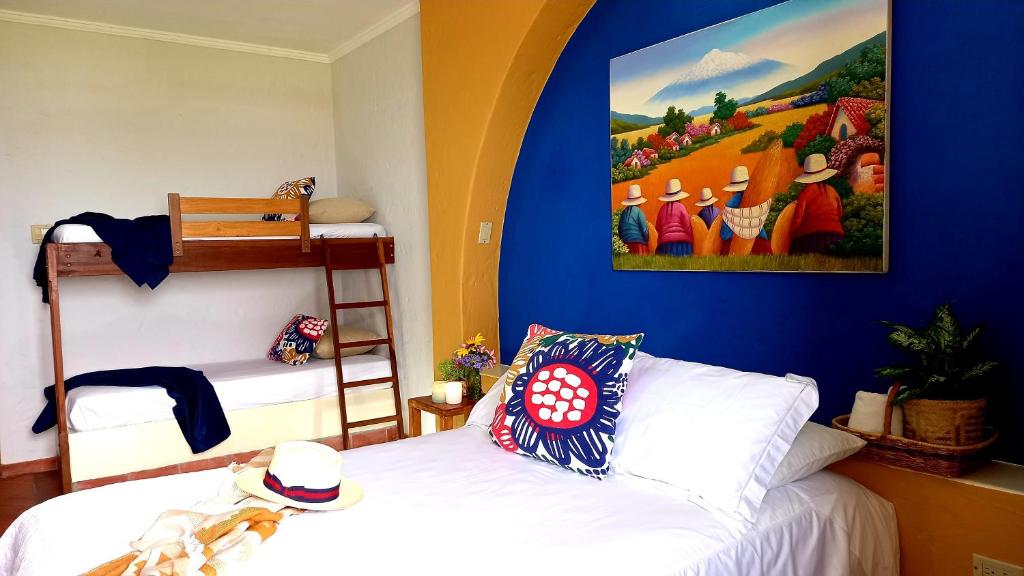 Postel nebo postele na pokoji v ubytování Casa Amarilla