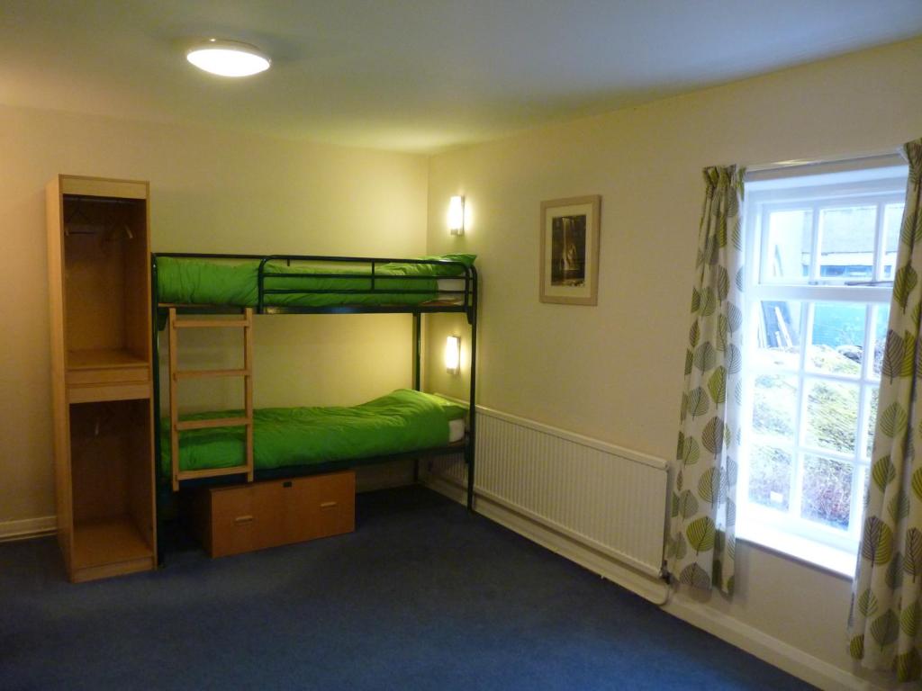 Postel nebo postele na pokoji v ubytování Ingleton Hostel