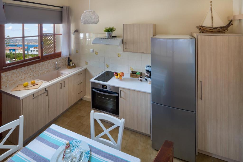 Kuchyňa alebo kuchynka v ubytovaní Avra Apartments