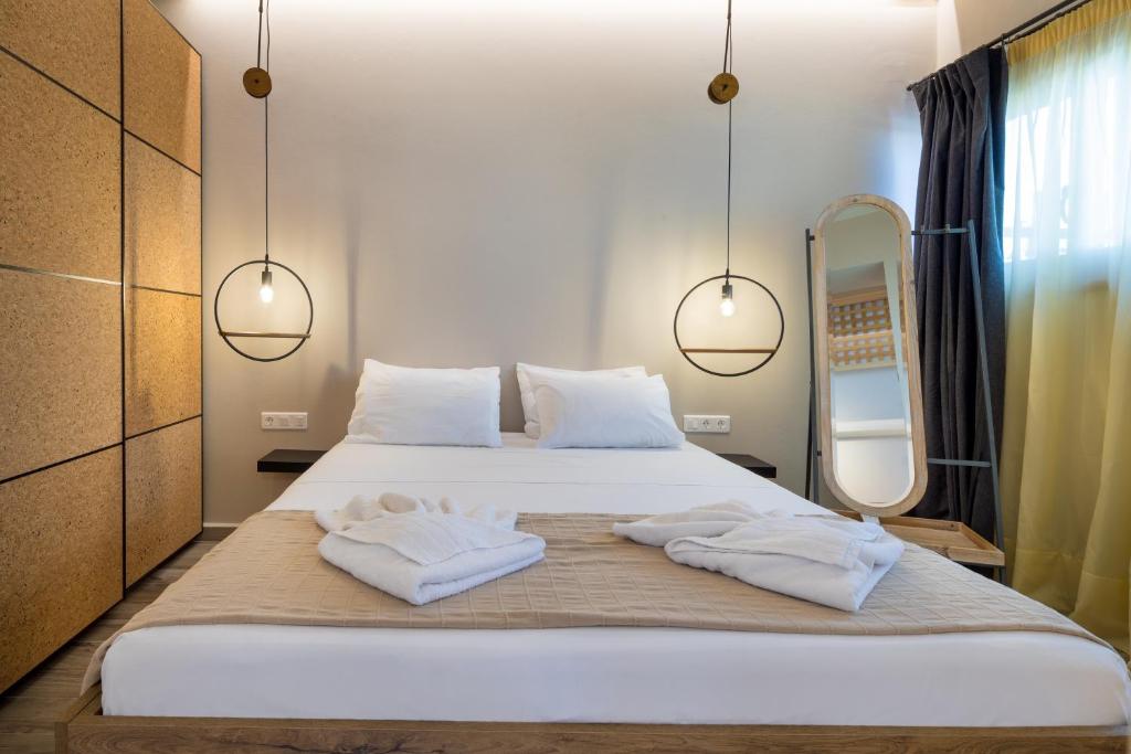 Posteľ alebo postele v izbe v ubytovaní Avra Apartments