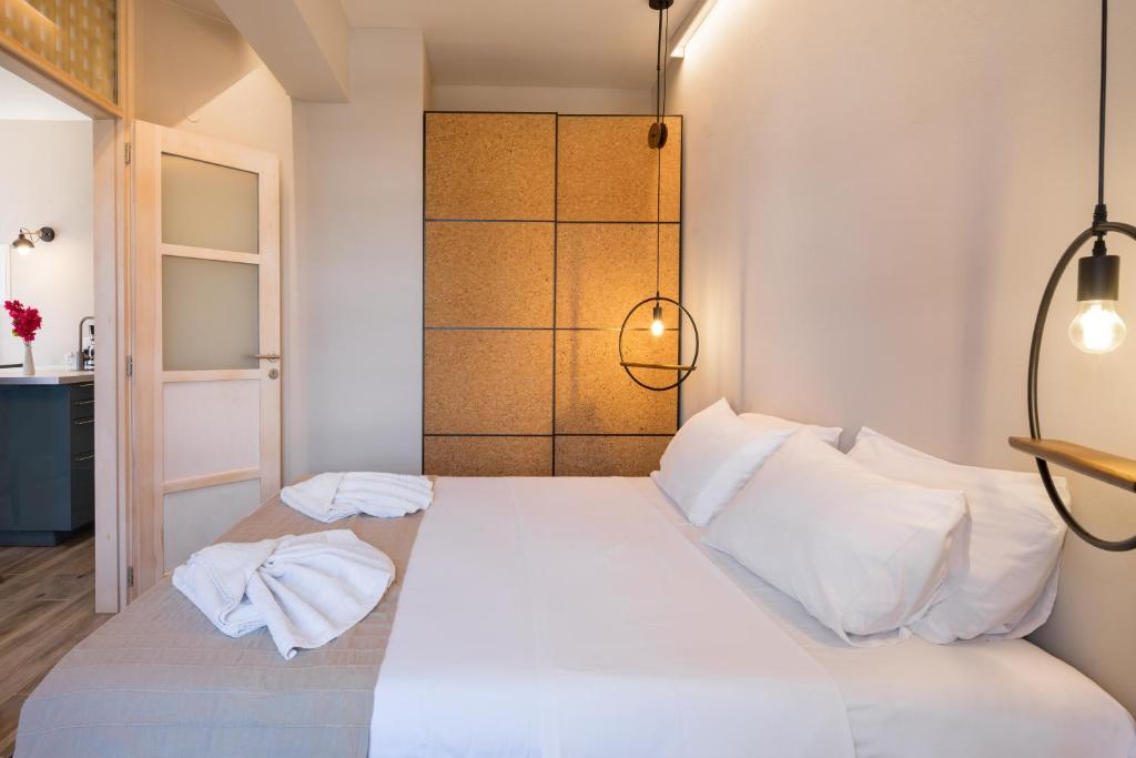 Posteľ alebo postele v izbe v ubytovaní Avra Apartments