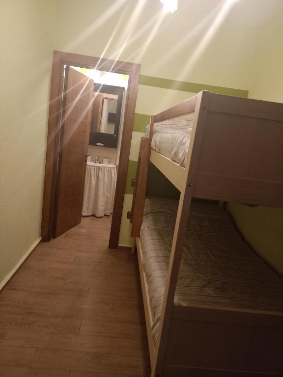 Postel nebo postele na pokoji v ubytování La Cerca