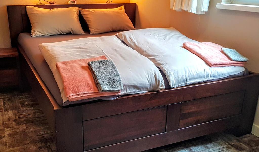 Postel nebo postele na pokoji v ubytování BnB Comfort Guesthouse Olten - Lostorf