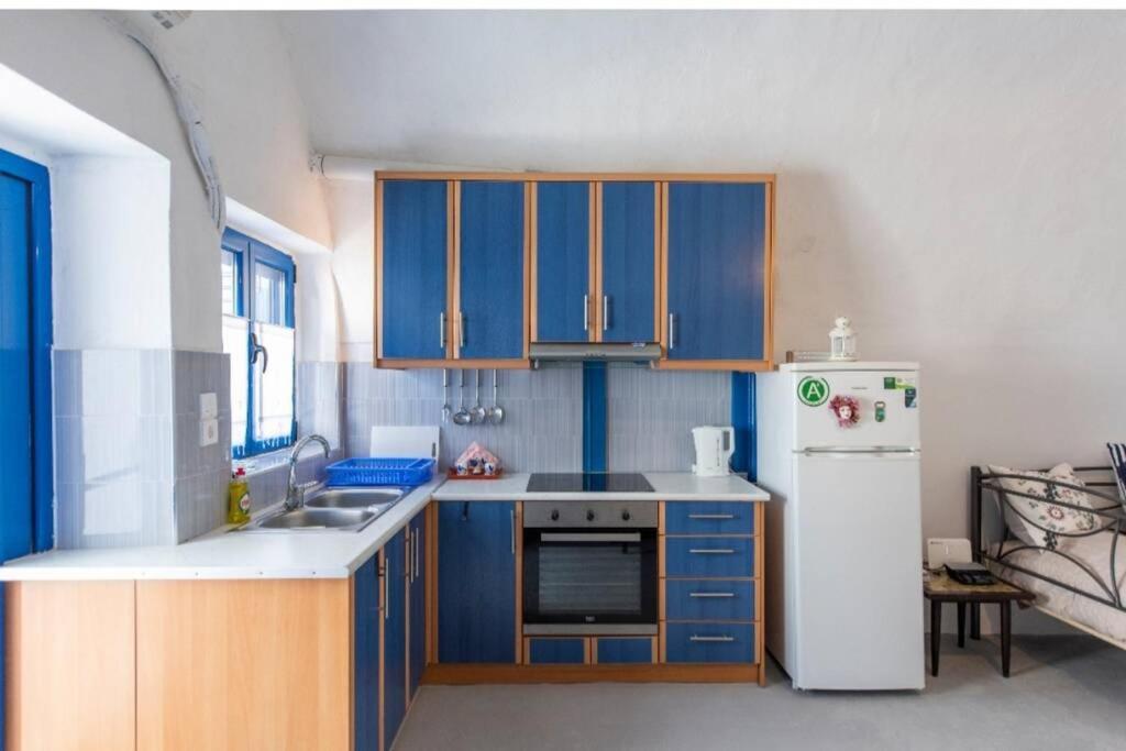 Kuchyň nebo kuchyňský kout v ubytování easy going santorini house