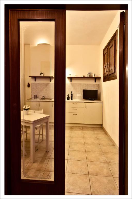 Kuchyň nebo kuchyňský kout v ubytování AGRITURISMO CASA VACANZE Antico Baglio