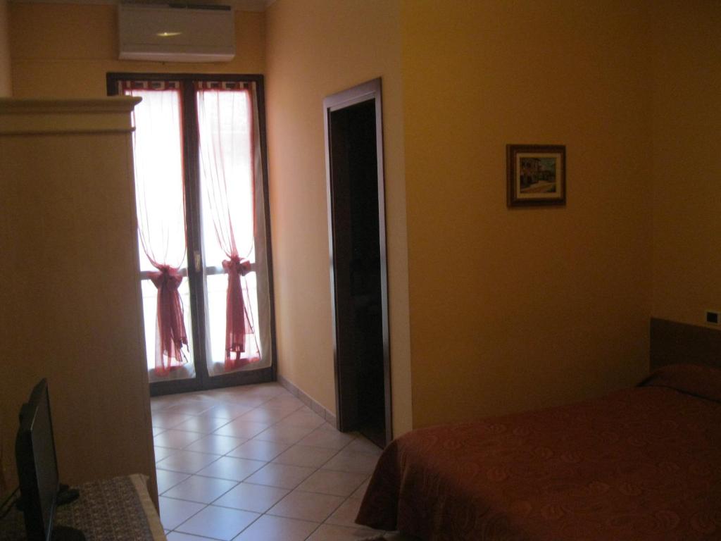 Postel nebo postele na pokoji v ubytování Trattoria Milani