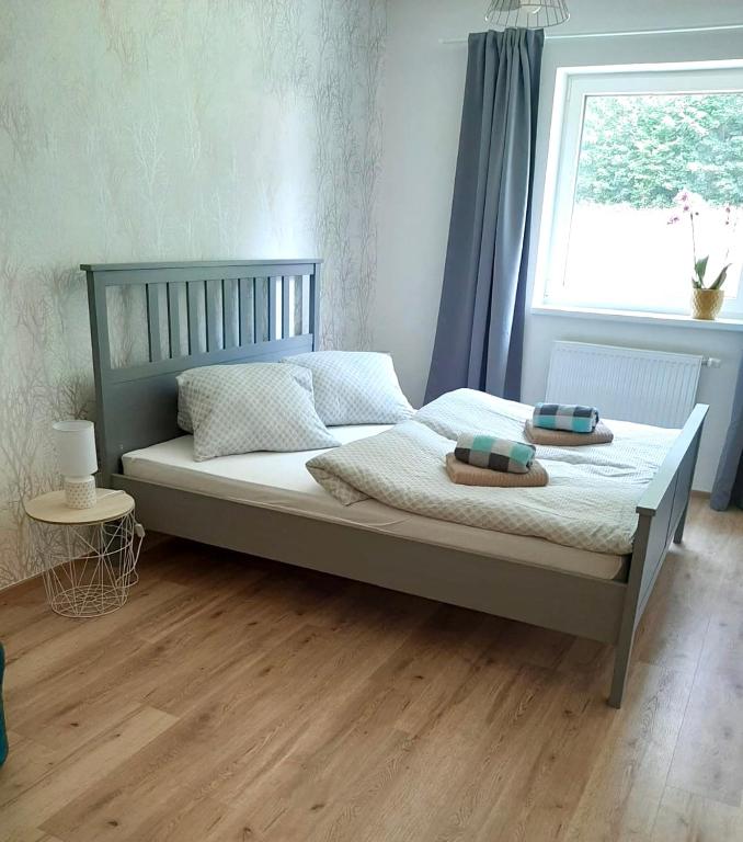 Postel nebo postele na pokoji v ubytování Apartmány Trio Horní Maršov