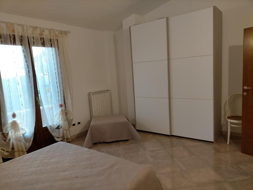 Postel nebo postele na pokoji v ubytování LaRosa Maruggio