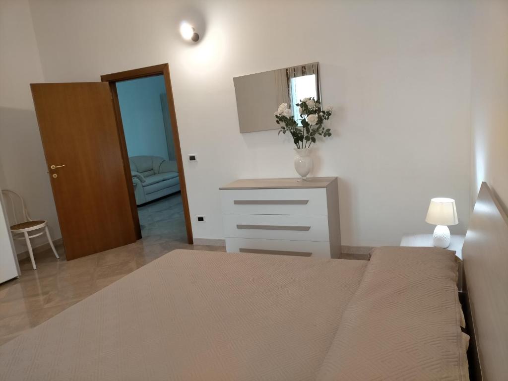 Postel nebo postele na pokoji v ubytování LaRosa Maruggio